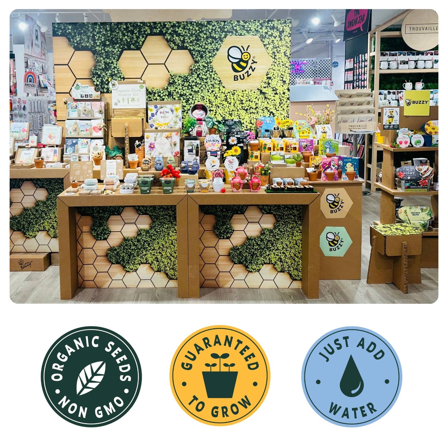 Product display with 'Buzzy' branding in a store setting, featuring promotional logos at the bottom.