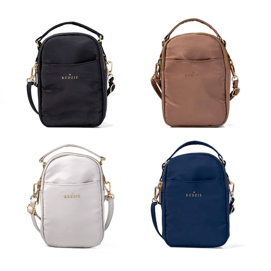 Four KEDZIE bags in black, brown, white, and blue on a white background