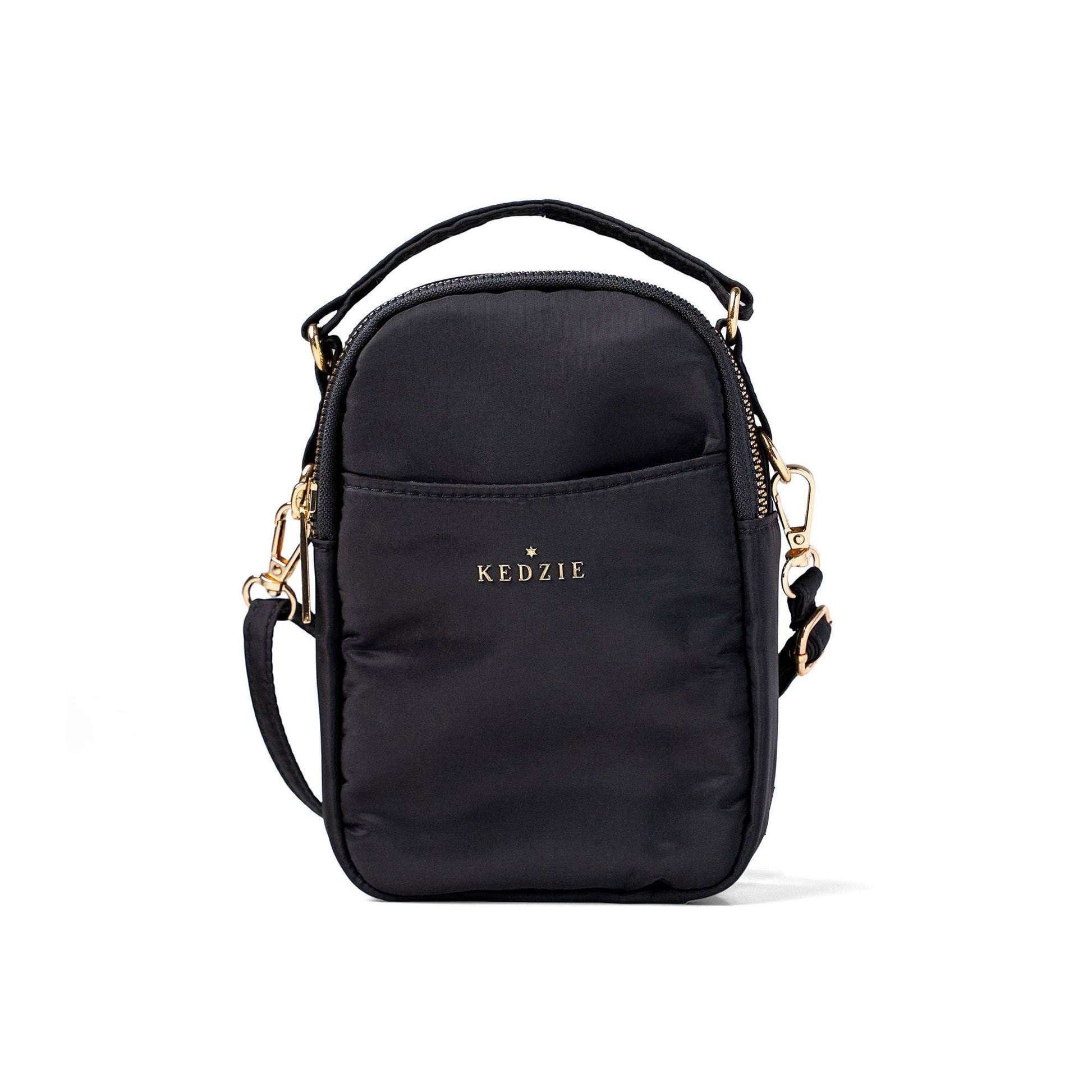 Black crossbody bag with 'KEDZIE' branding on a white background