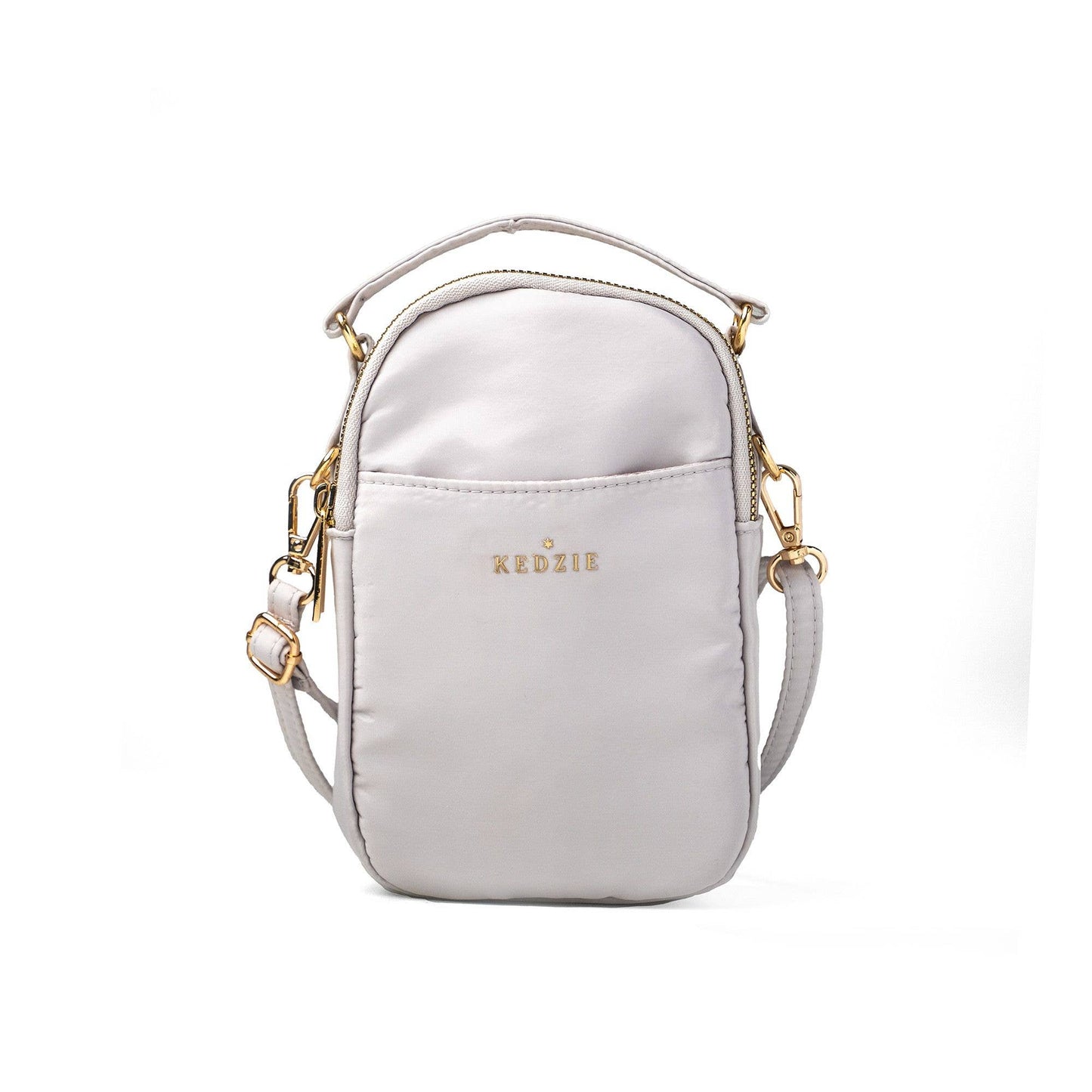 Light gray crossbody bag with gold accents on a white background